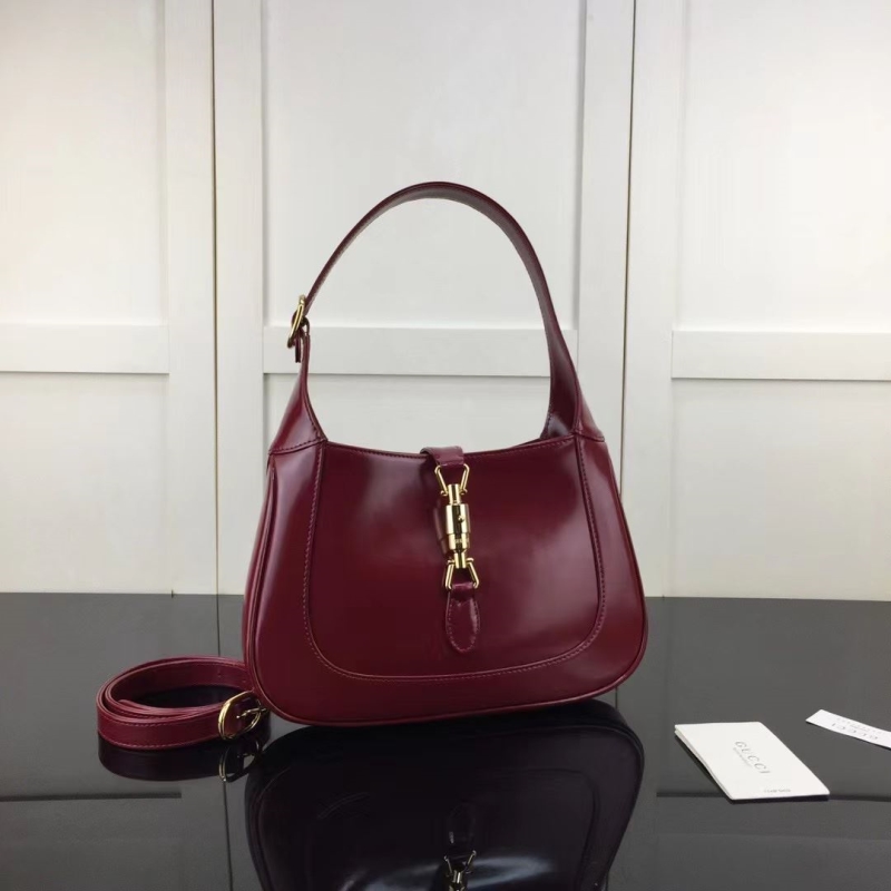 G*u*i top handle bags